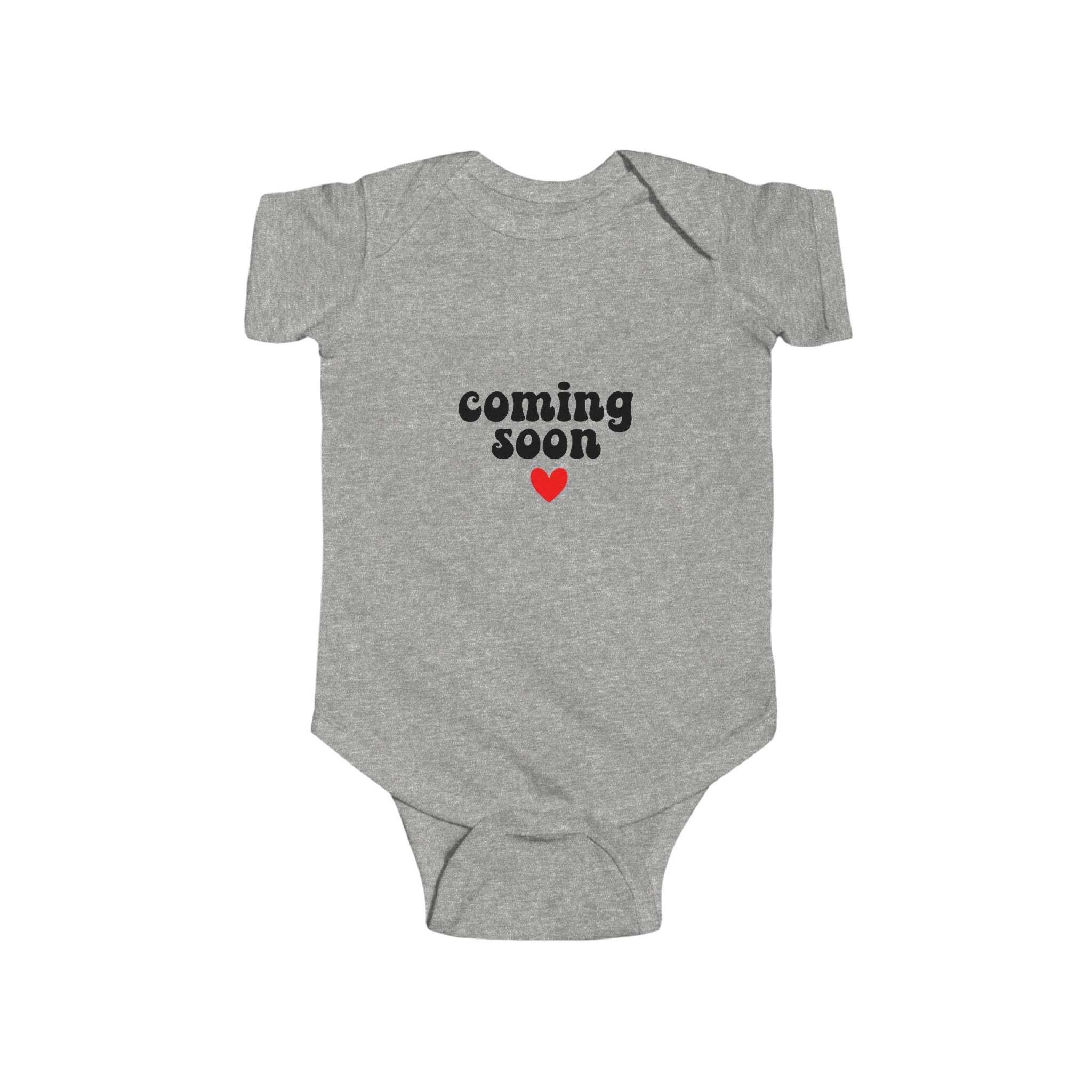 Grey baby bodysuit with "Coming Soon" text and red heart accent

