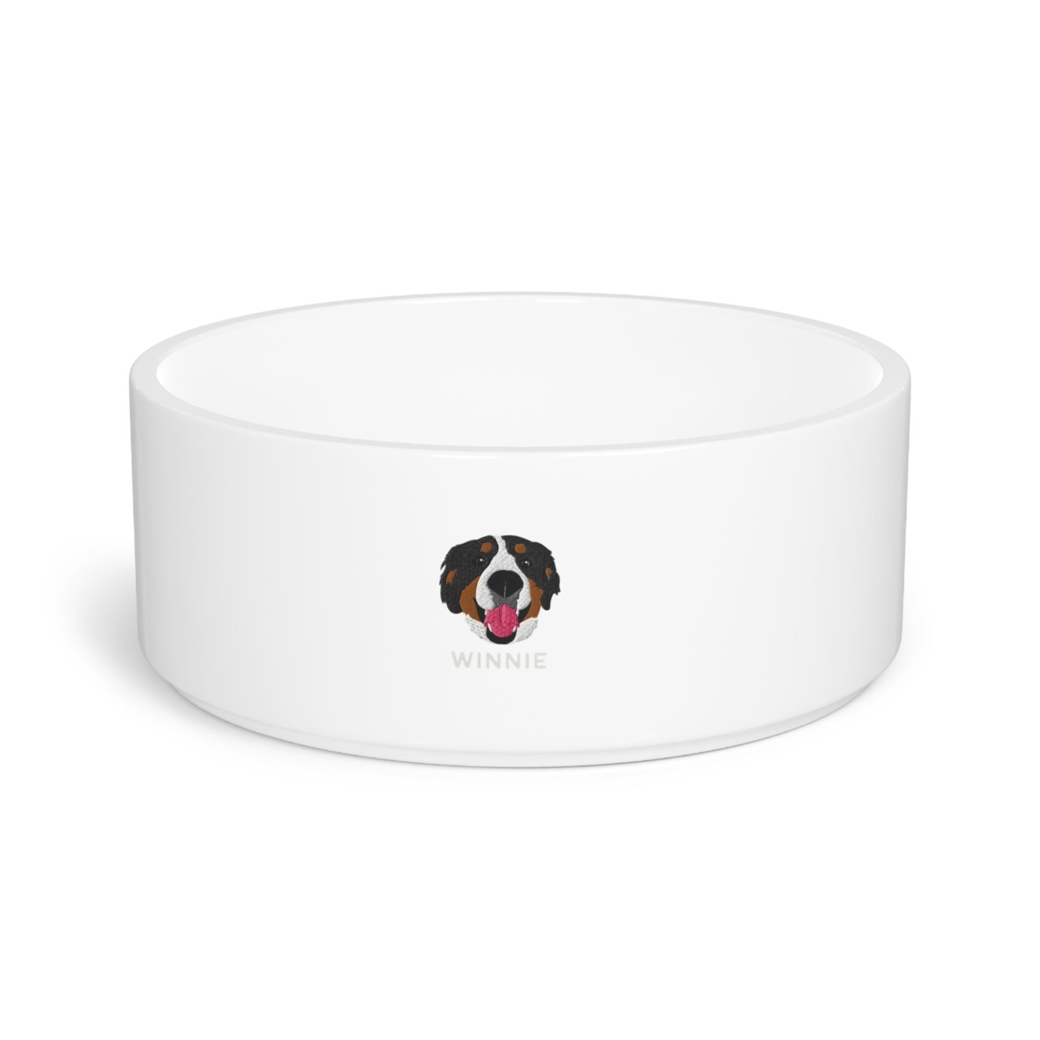 White ceramic custom pet bowl with embroidered-style dog face and the name “Winnie” printed on the front; 16oz capacity with glazed finish.

