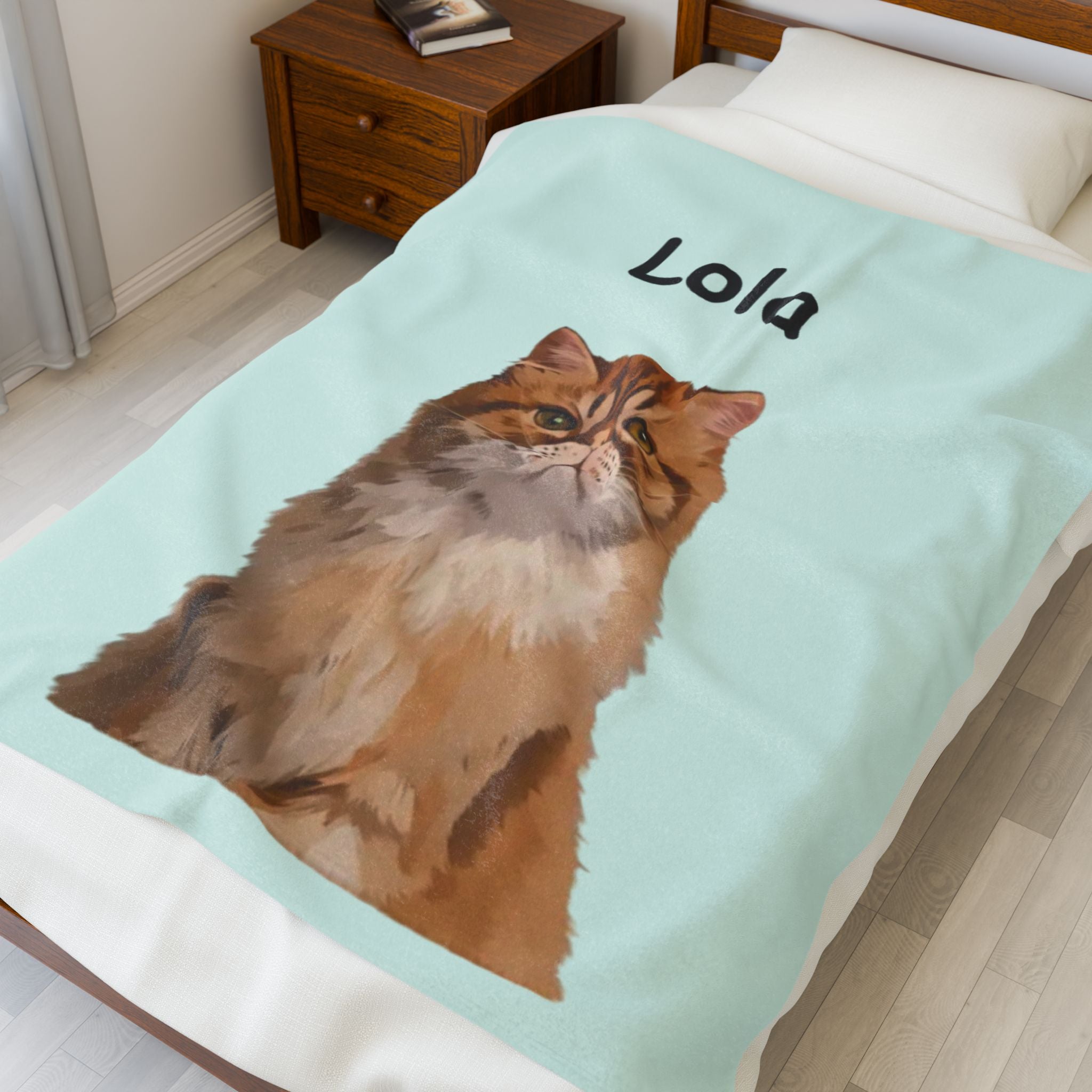 Pet portrait blanket with a custom illustrated pet and the name