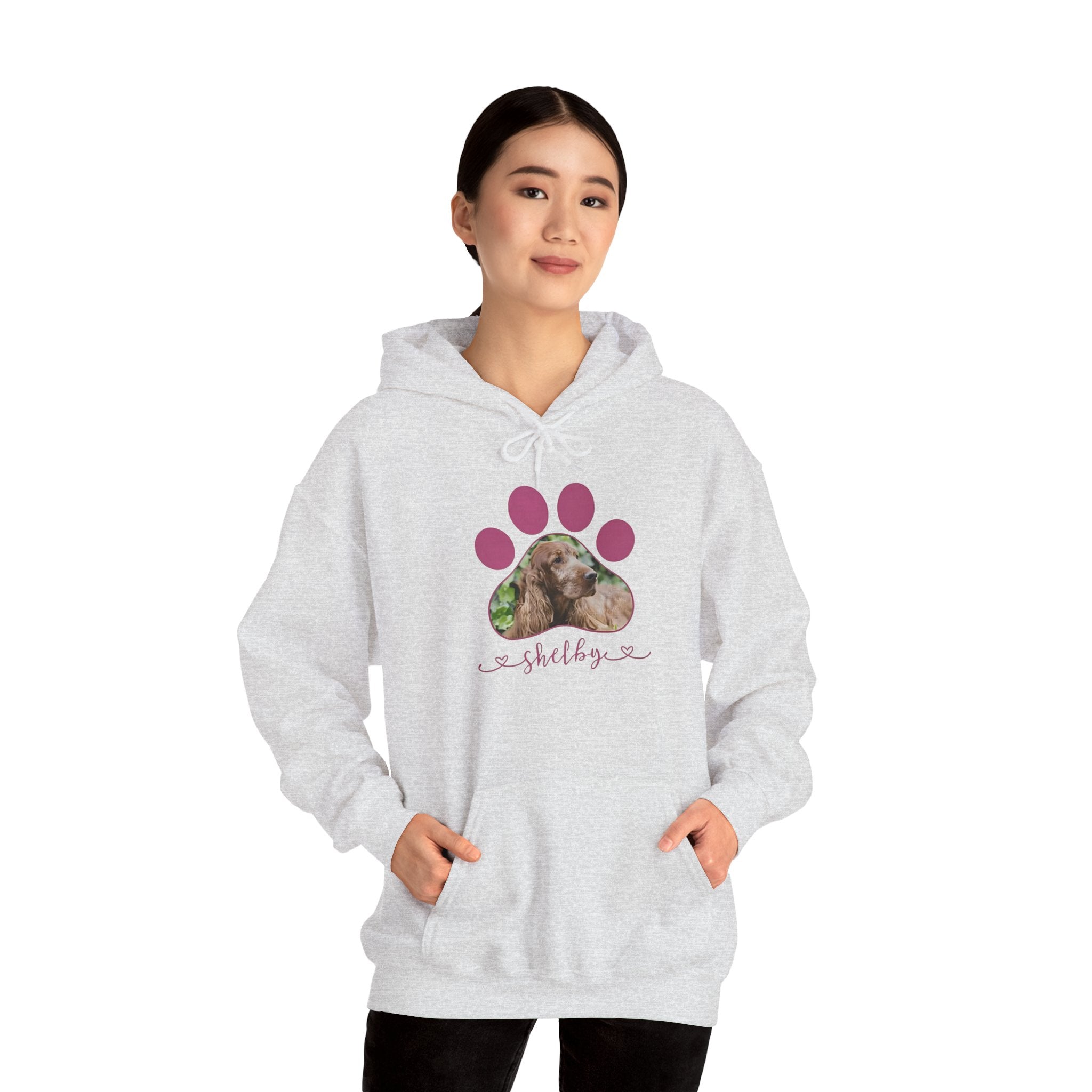 Personalized dog photo hoodie with paw print and custom pet name design in DTG print.

