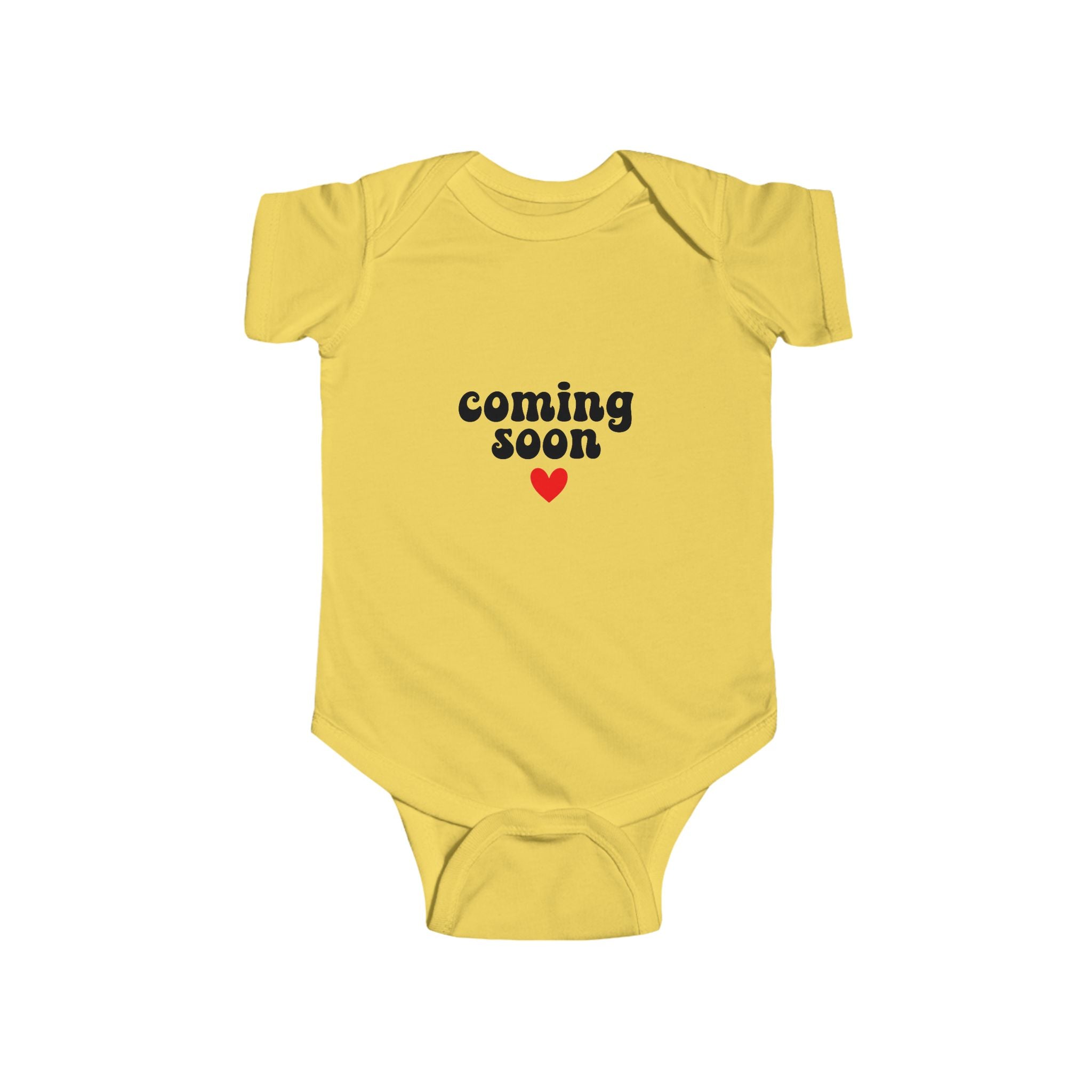 Yellow baby bodysuit with "Coming Soon" and heart detail