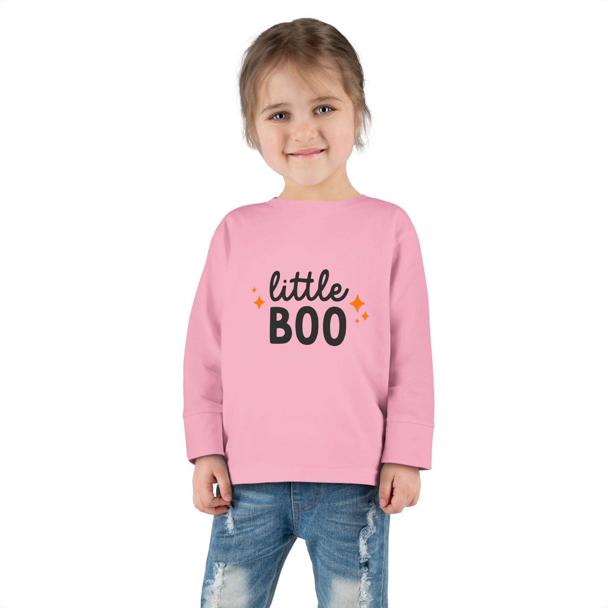 Girl wearing pink Little Boo shirt with cute smile