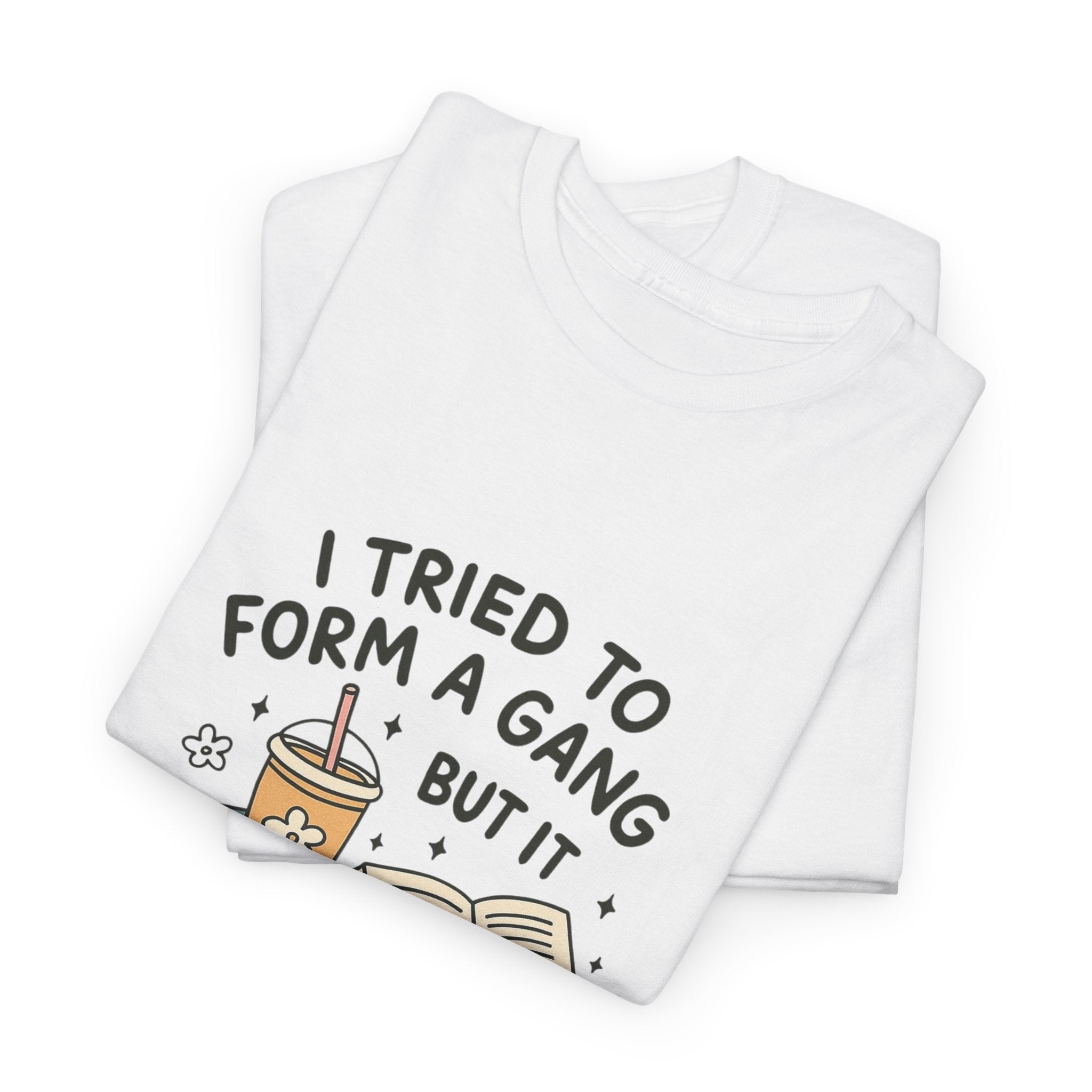 White t-shirt with cute illustrated design of books, iced coffee, and the quote "I tried to form a gang but it turned into a boook club" printed on front

