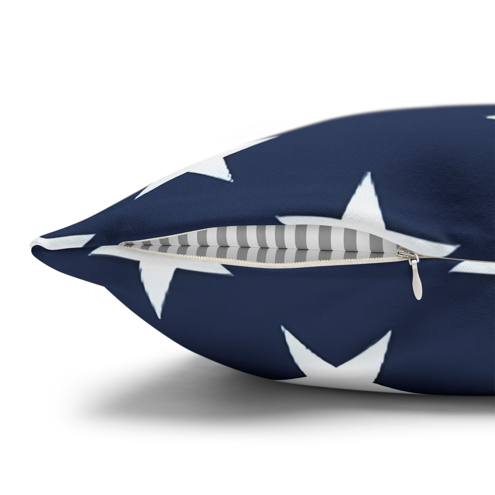 Square throw pillow with white stars on navy blue background—great for patriotic decorating and to shop Fourth of July throw pillows for indoor or outdoor use.