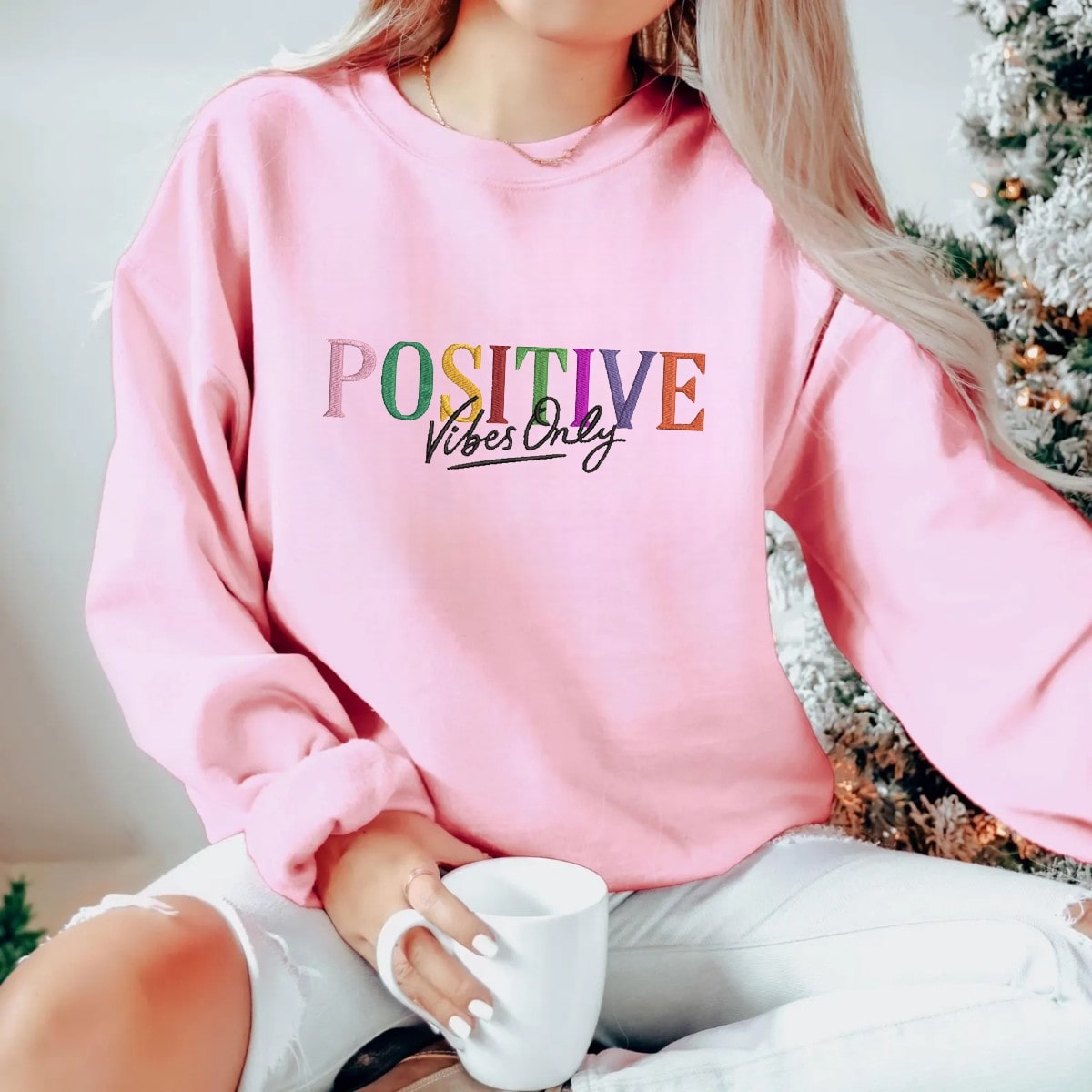 Vibrant Positive Vibes Only graphic sweatshirt for spreading good energy.
