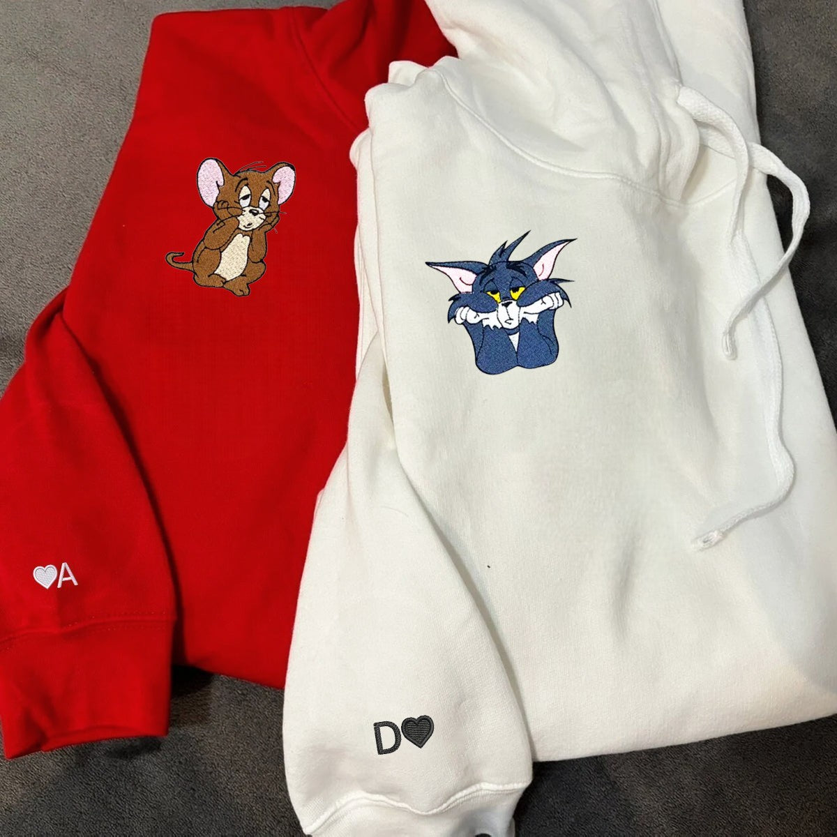 Soft and cozy couple hoodies showcasing timeless mouse and cat characters.