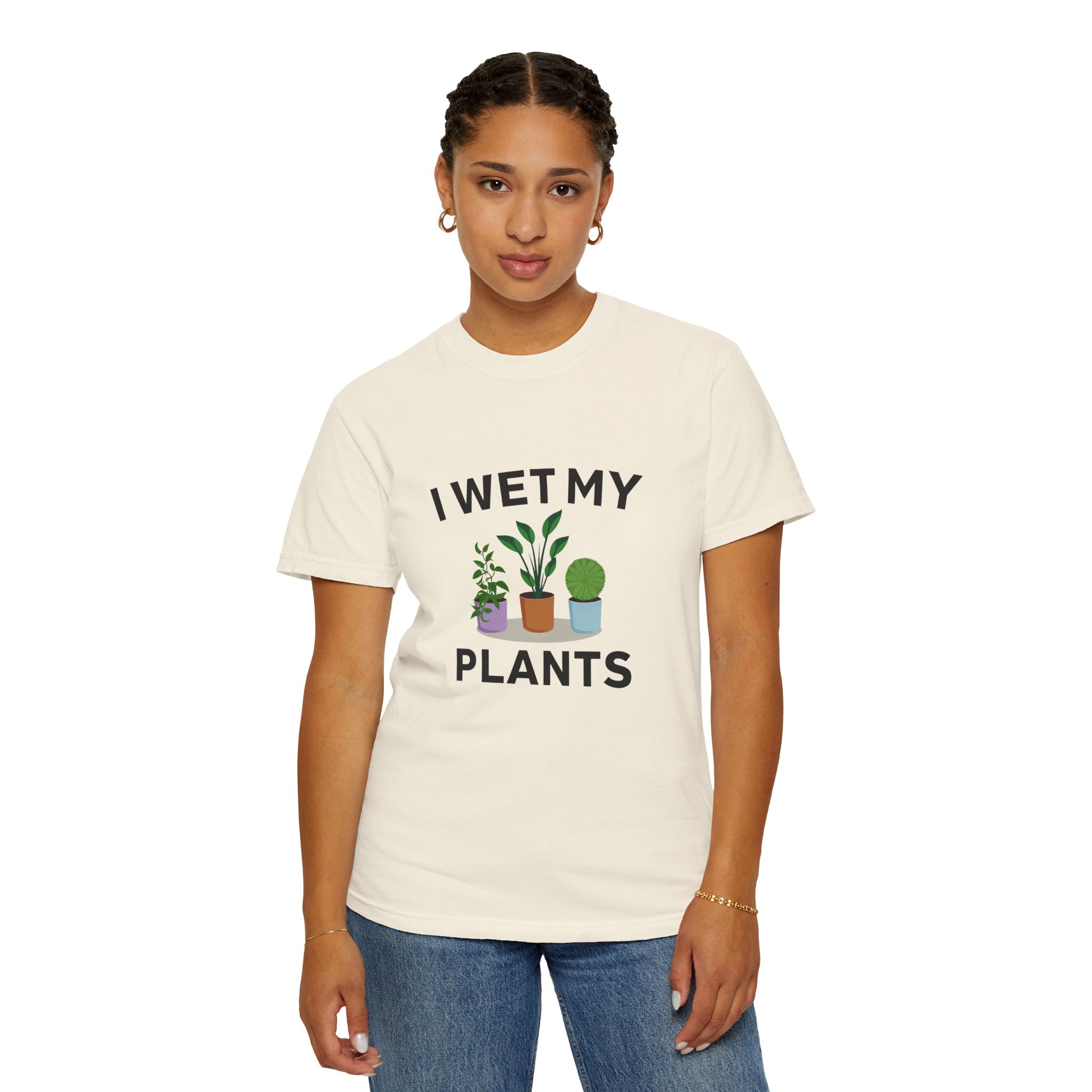 White unisex t-shirt with “I Wet My Plants” text and three illustrated potted plants below the print
