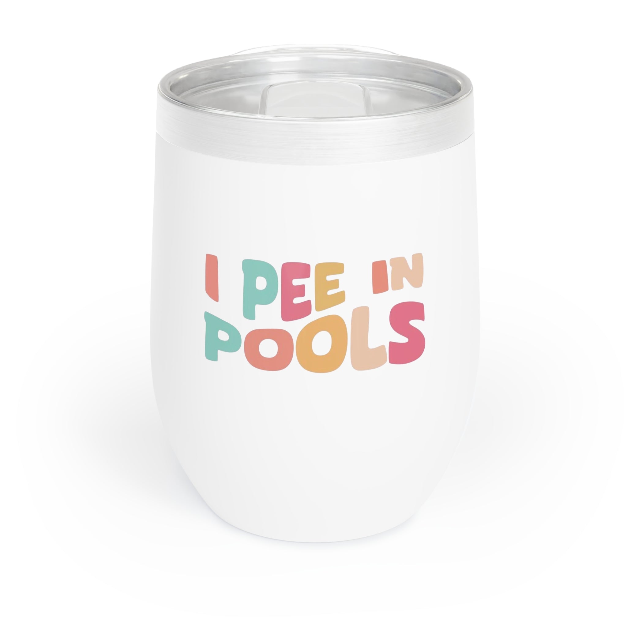 Spill-proof wine tumbler on a table with colorful candy and corkscrew