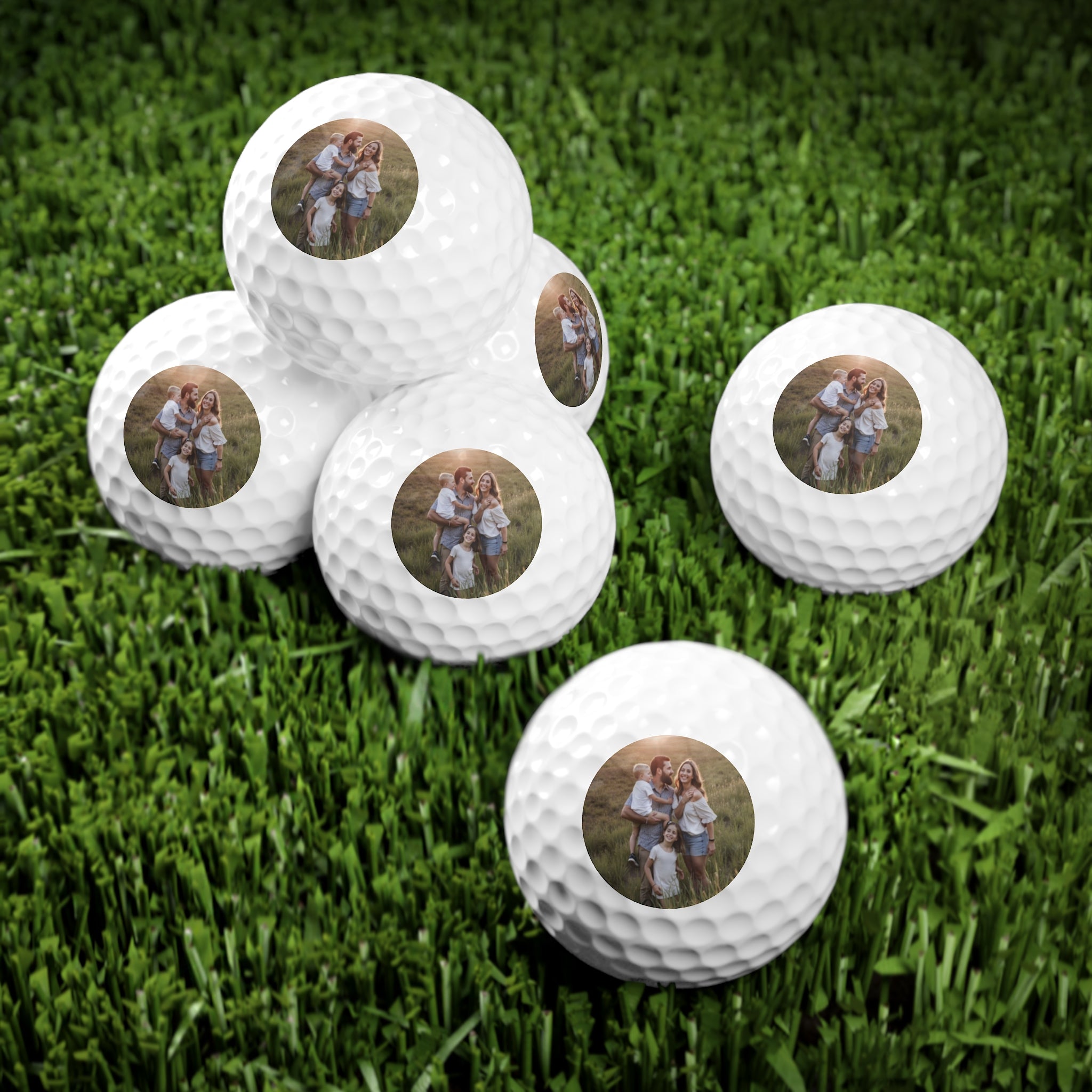 Set of custom photo golf balls with a couple’s image printed on each—ideal personalized gift for golfers and romantic anniversary gifts for him and her.