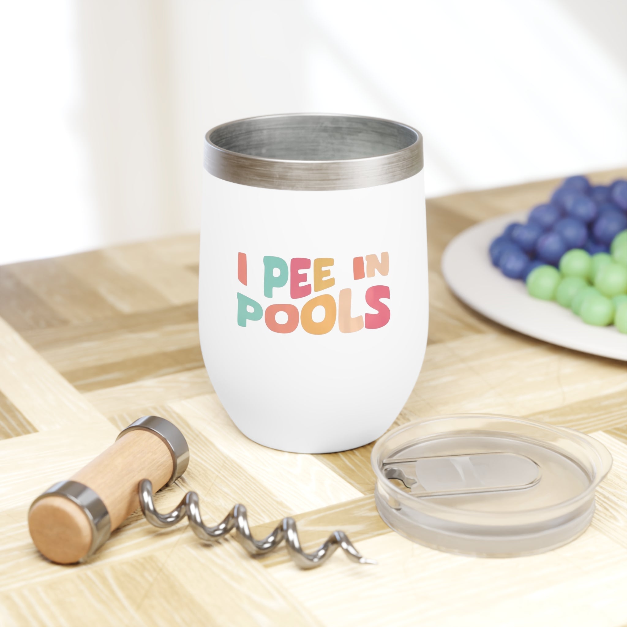 Chill wine tumbler with lid and colorful, playful design