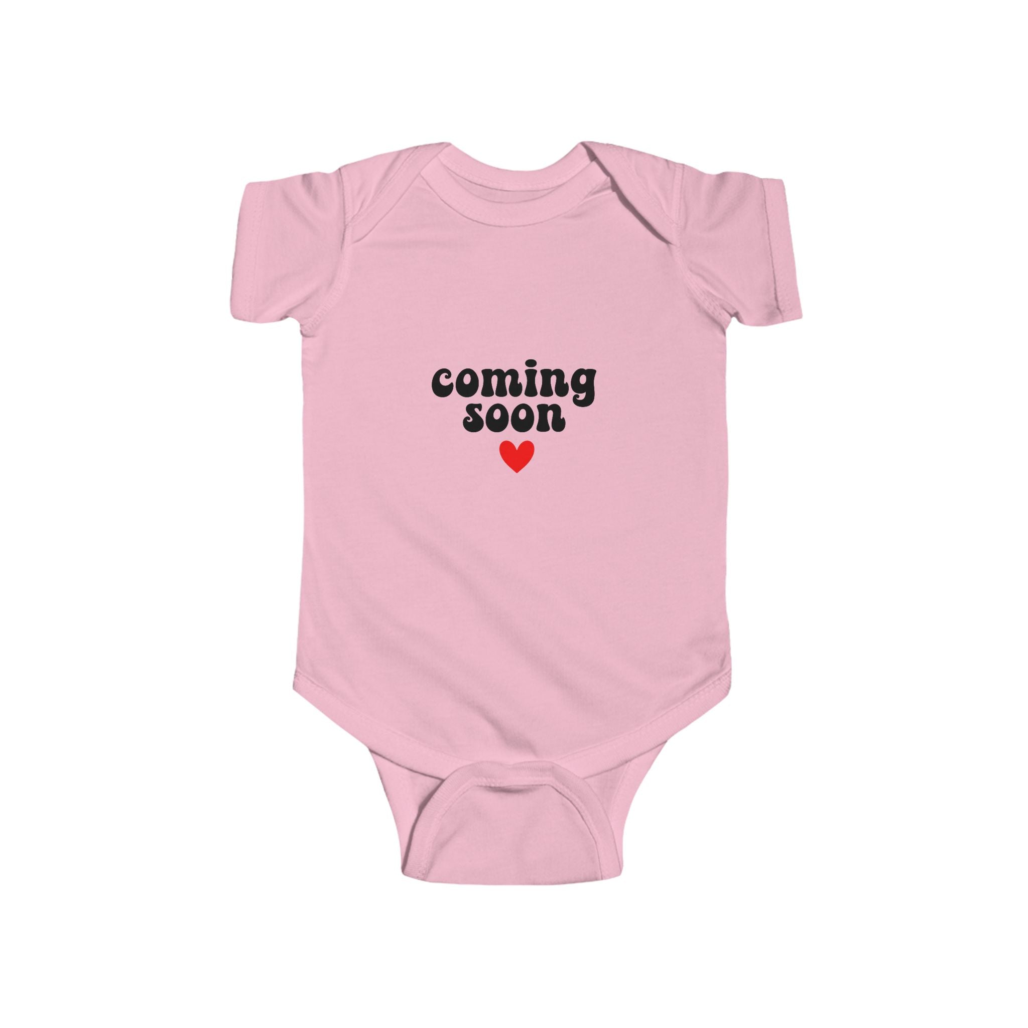 Pink baby bodysuit with "Coming Soon" and heart graphic
