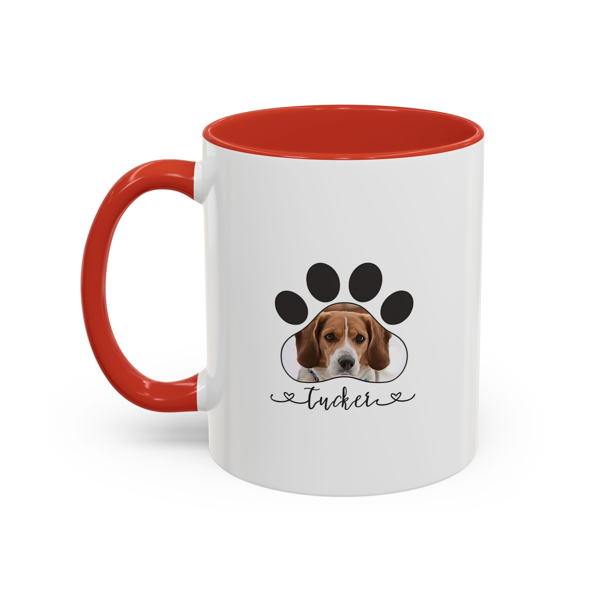 Custom pet photo mug with a paw print design and personalized dog name on white ceramic with orange handle.

