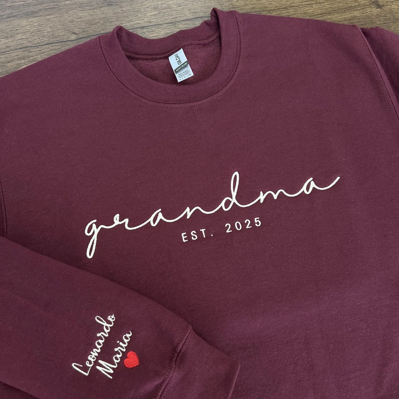 Personalized matching embroidered sweatshirts for mom and grandma with “mama” and “grandma” script text