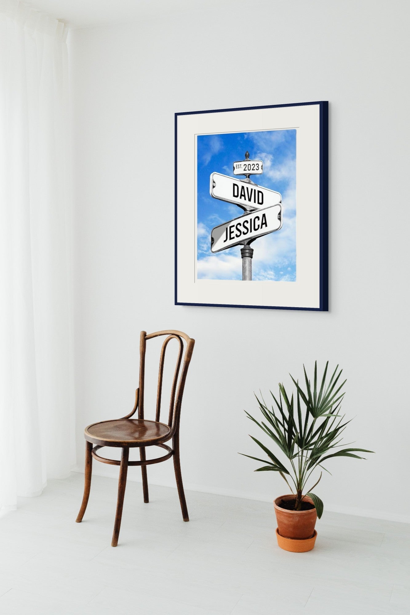 Custom romantic wall decor showing crossed street signs with couple names